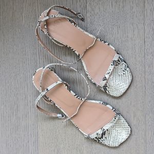 Minimal white python sandals by LoQ